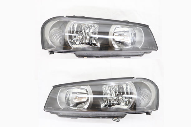 [UN-USED] NISSAN Headlight Housing LH & RH Set - BNR34 2000/08-